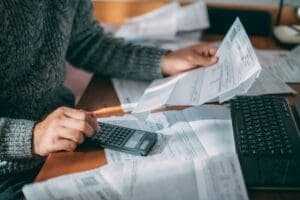 man trying to save money on his heating bill