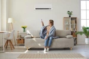 cold air blowing directly at a woman from the air conditioning