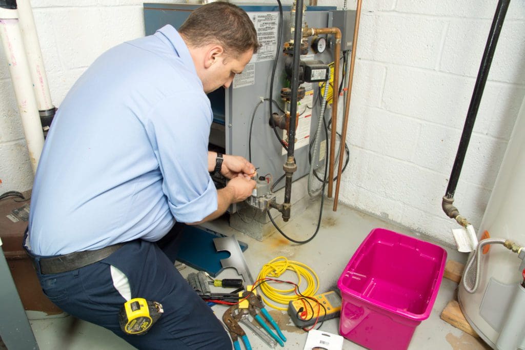 technician providing furnace repair services